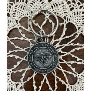 North American Fishing Club Metal Key Chain. 1970’s 1 5/8 Inch diameter